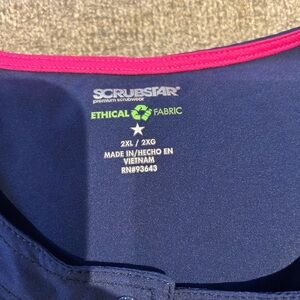 Scrubstar Premium Navy Scrub Jacket with Pink Accent